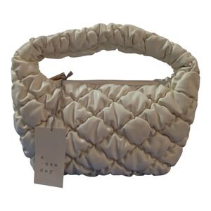 Bubble Quilted Clutch Handbag - A New Day Cream: Zip Closure, Single Handle, 11"